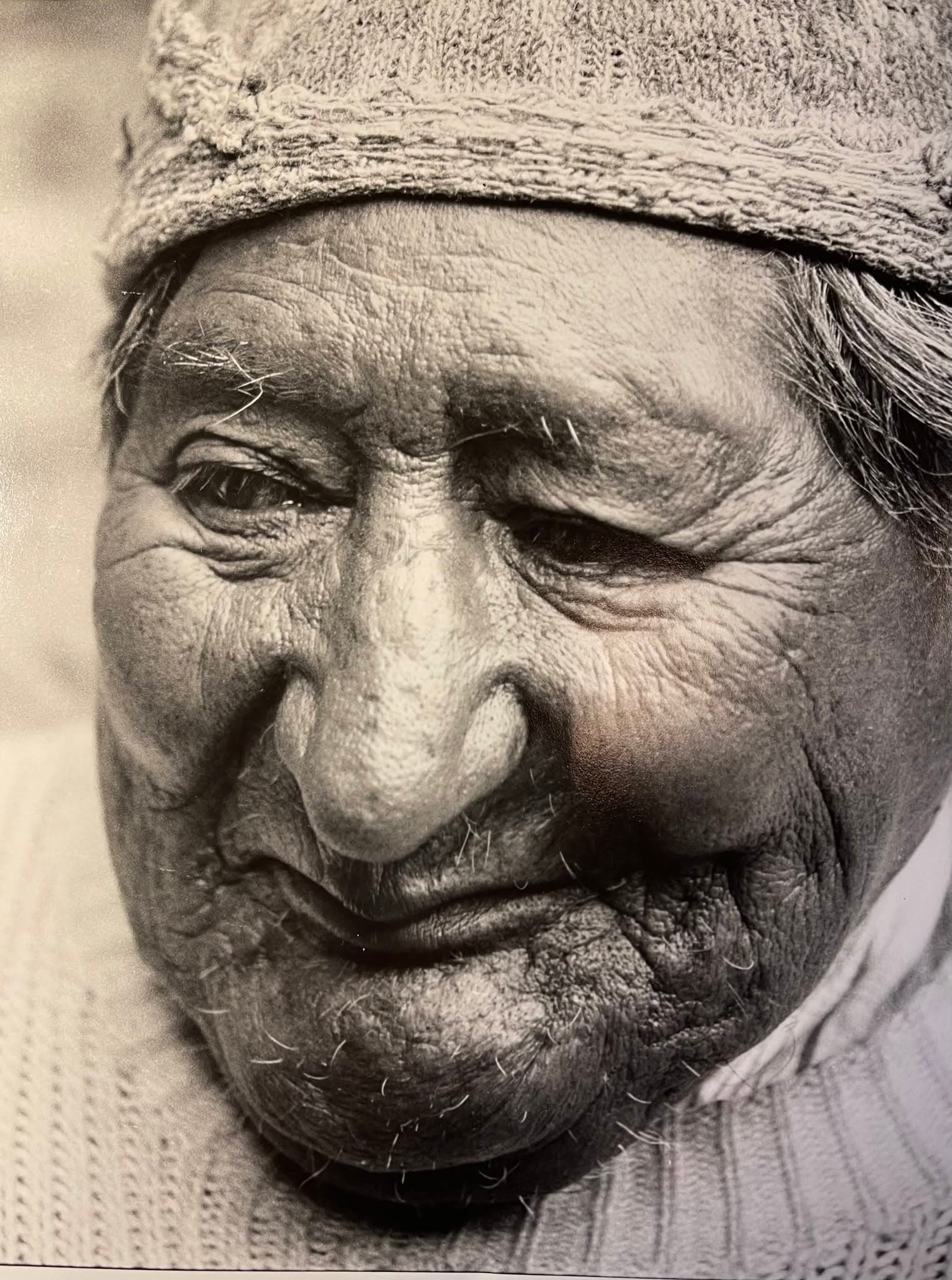 A sepia-toned portrait of the storied face of Peruvian don Benito Corihuaman Vargas