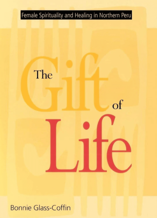 A bright yellow book cover with subtle geometric forms in the background, with "The Gift of" appearing in yellow-black also, and "Life" standing out in bright red.